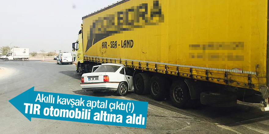 TIR otomobili altına aldı