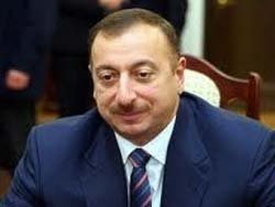 Aliyev'den 150 gazeteciye ev hediyesi