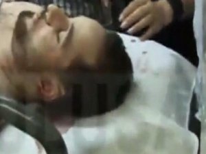 Ahmet Atakan'ın cesediyle propaganda pozu