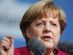 Almanya'da Merkel 4 yıl daha görevde