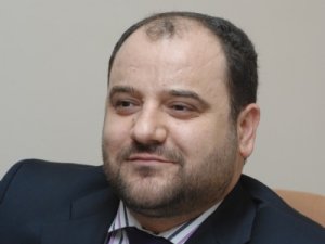 Öksüz'den başörtüsü yorumu