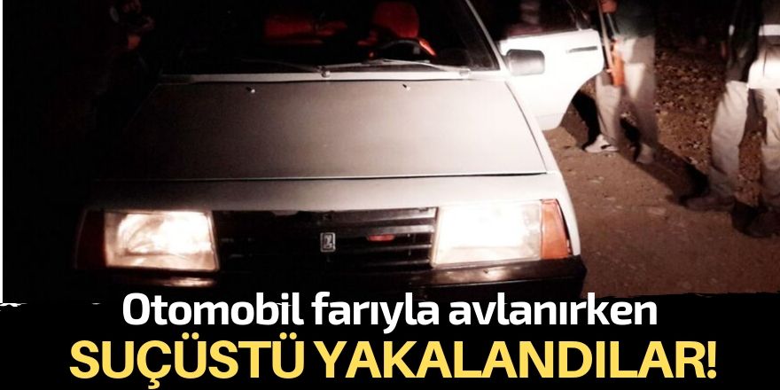 Otomobil farıyla tavşan avlayanlara suçüstü