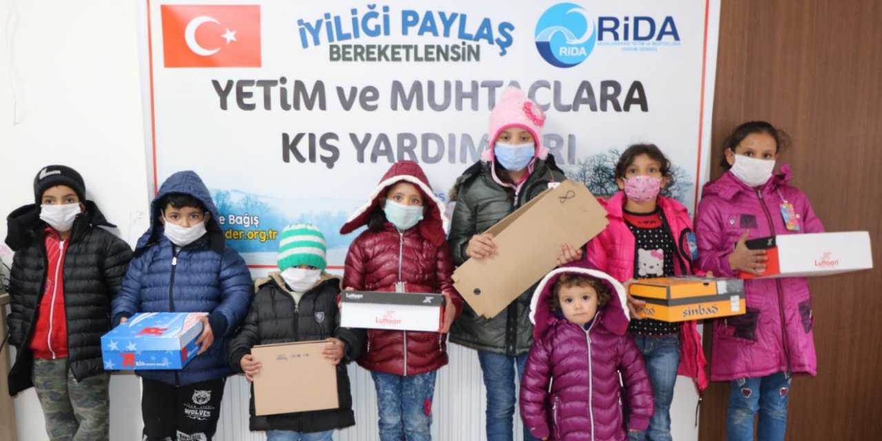 RİDA’dan 550 yetime kışlık mont ve bot