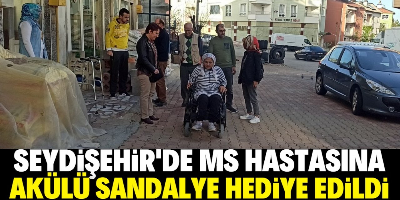 Seydişehir'de MS hastasına akülü sandalye hediye edildi