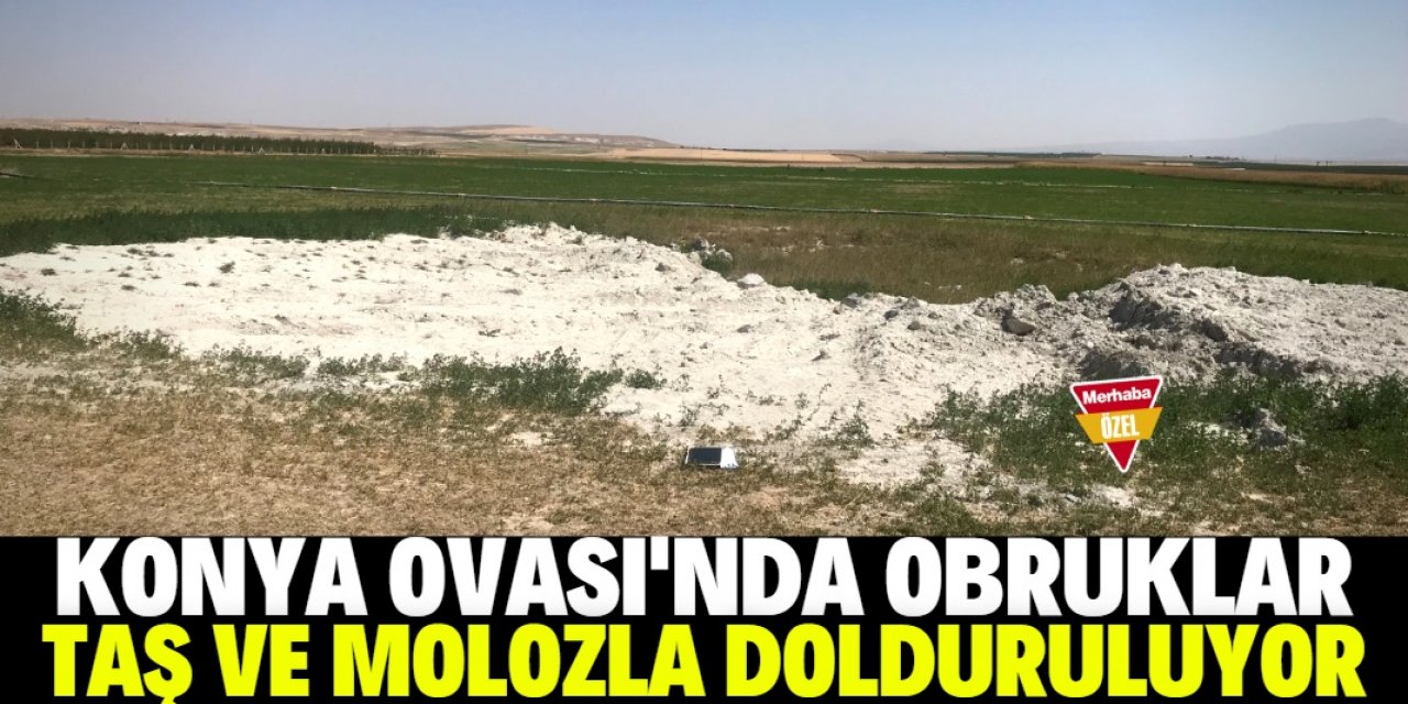 Konya çiftçisi obrukları moloz ve taşlarla dolduruyor