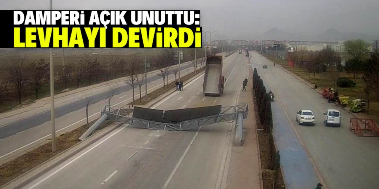 Konya'da damperi açık unutulan kamyon bilgilendirme levhasını devirdi