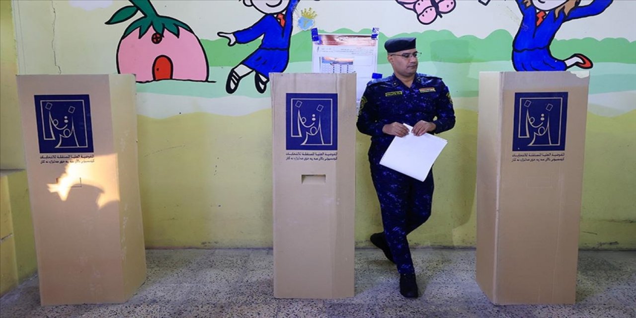 Irak'ta güvenlik güçleri ve iç göçmenler, yerel seçim için "erkenden" sandık başında