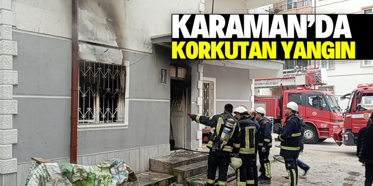 Karaman'da 4 katlı binanın zemin katında çıkan yangında hasar oluştu