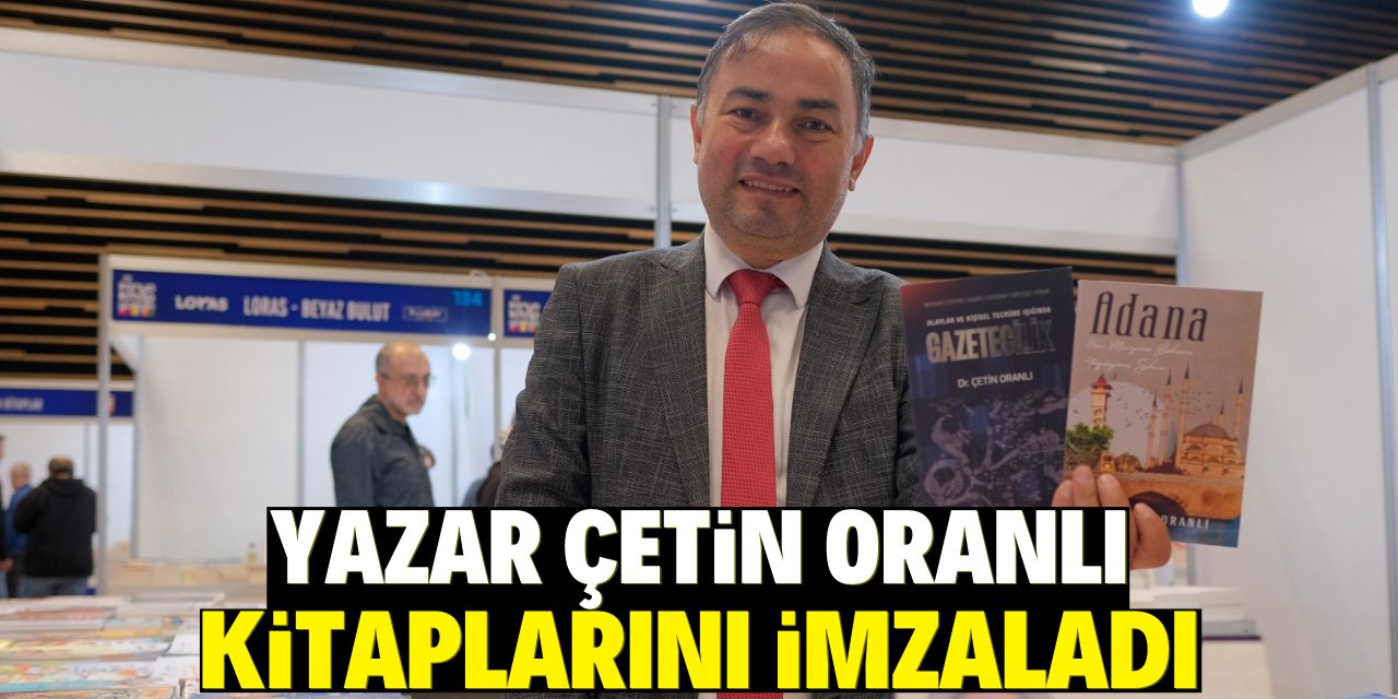 Yazar Çetin Oranlı  kitaplarını imzaladı