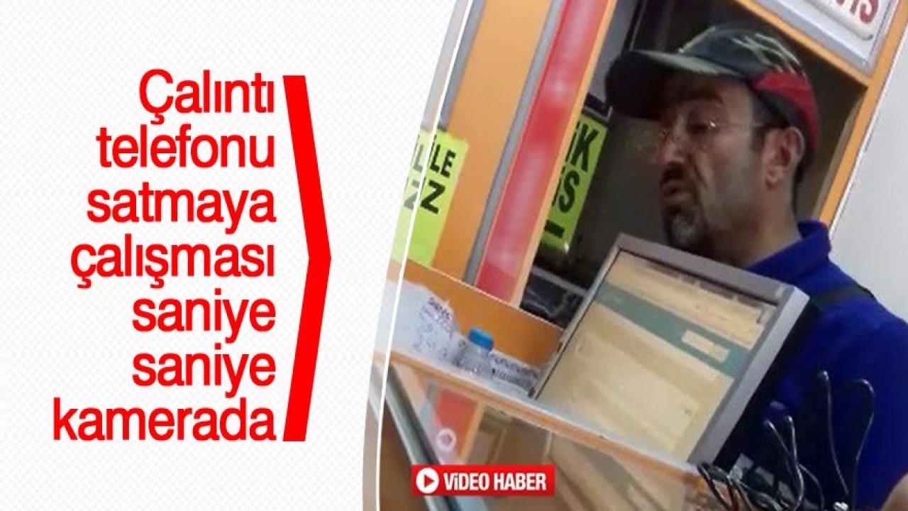 Çaldığı telefonu satma çabası kamerada