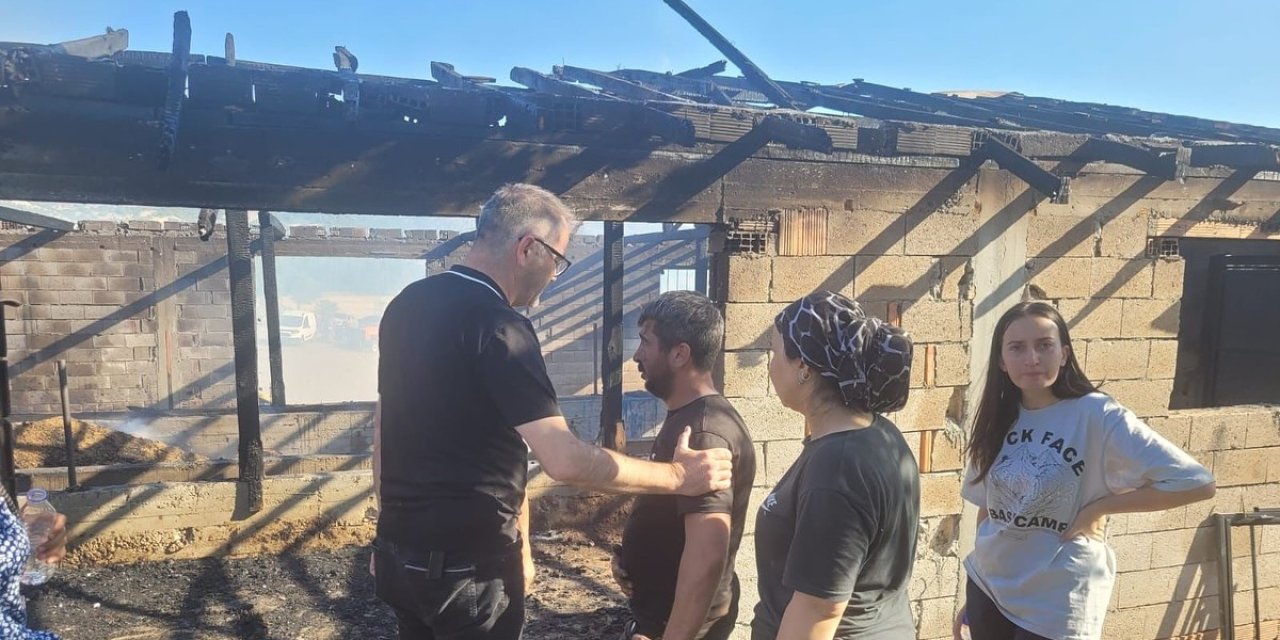 Ustaoğlu'ndan ahırı yanan aileye ziyaret