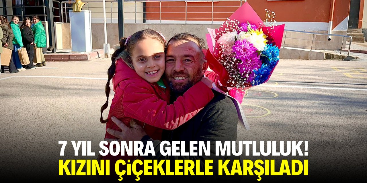 7 yıl sonra gelen mutluluk! Kızını çiçeklerle karşıladı
