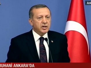 Erdoğan: Bayrağı indirenler bedelini ödeyecek