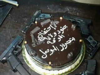 IŞİD Musul'un işgalini pastayla kutladı