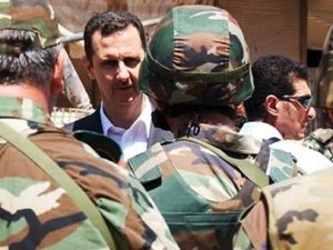 Esed'in ordusu 20 kişinin kafasını kesti