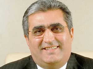 Konuk’tan Mustafa Arslan’a kutlama