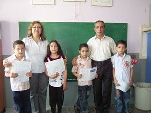 Akşehir'de dördüzlerin karne heyecanı