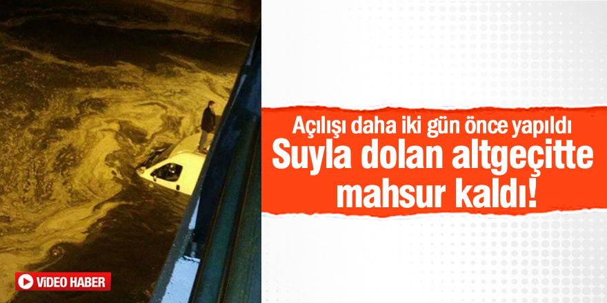 Suyla dolan altgeçitte mahsur kaldı! [VİDEO]