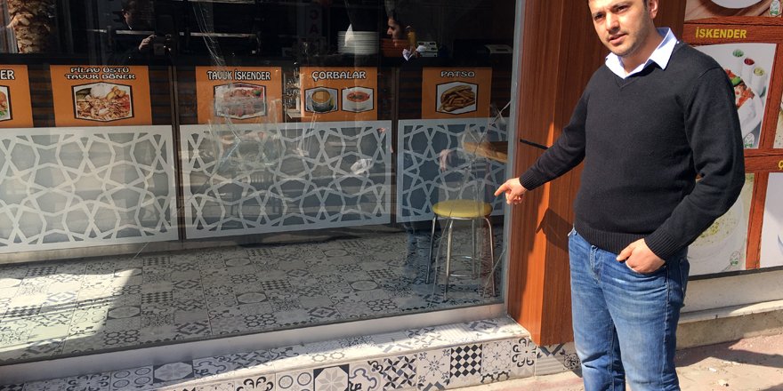 Hırsız, camını kırdığı iş yerine emekleyerek girdi