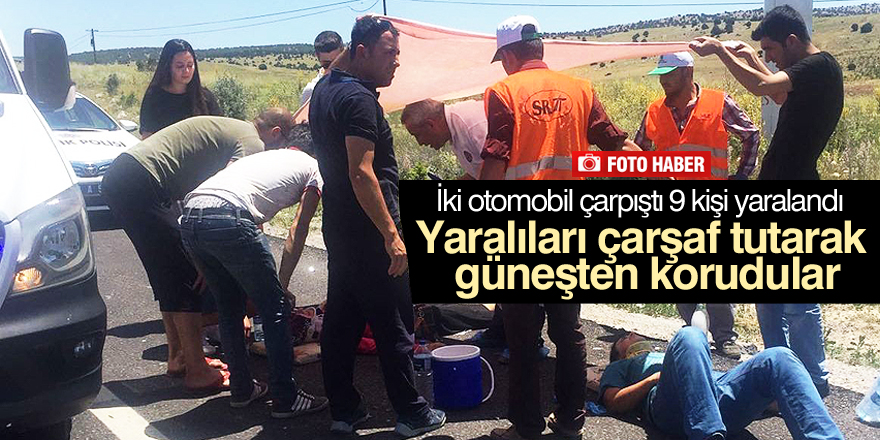 Yaralıları çarşaf tutarak güneşten korudular