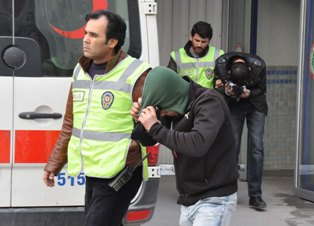 Şüphelileri, taktıkları ''bere'' ele verdi