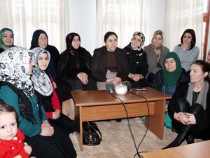 Gazi ve şehit eşleriyle bir araya geldi
