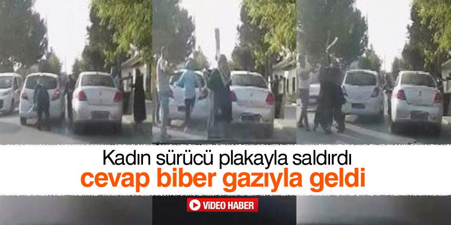 Kadın sürücü tartıştığı sürücüye plakayla saldırdı