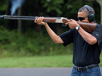 Obama'nın elinde tüfekle fotoğrafı yayımlandı