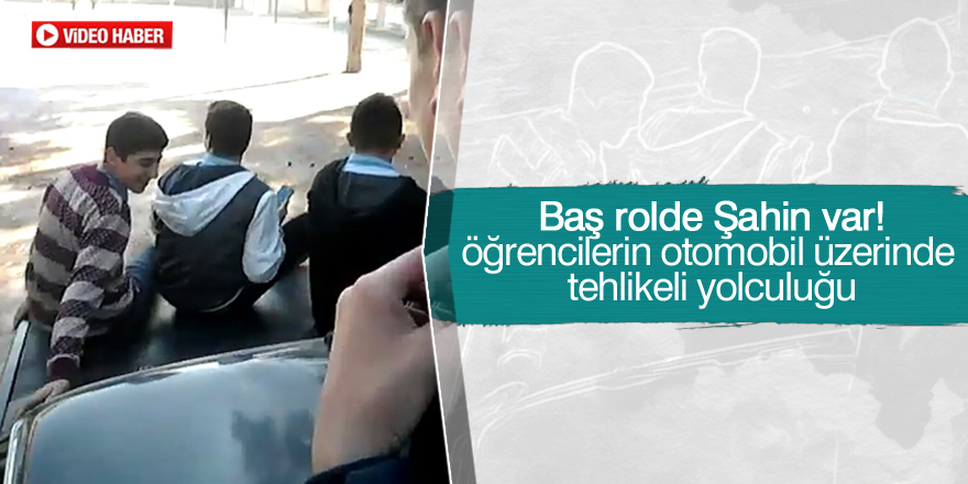 Okul bahçesinde öğrencilerden otomobil üzerinde tehlikeli yolculuk