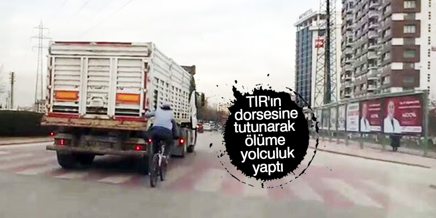 Canını hiçe sayan bisikletli tırın arkasına takıldı