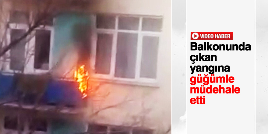 Balkonunda çıkan yangını pencereden su döküp söndürdü